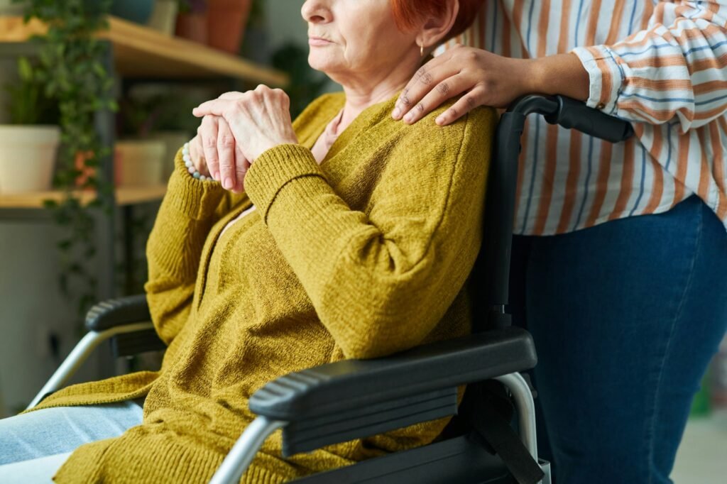 Senior woman with nurse at nursing home